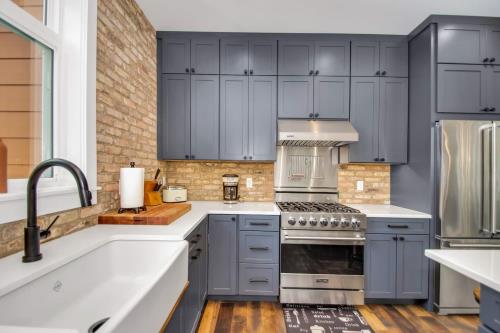 Farmesque With a Splash of Modern cottage kitchen in New Buffalo, MI.