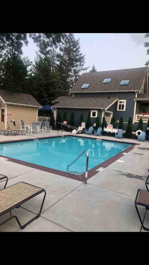 Farmesque With a Splash of Modern cottage community pool in New Buffalo, MI.